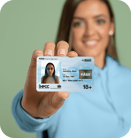 A person holding an IDGO identity card