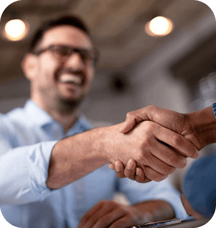 Two people shaking hands on a partnership